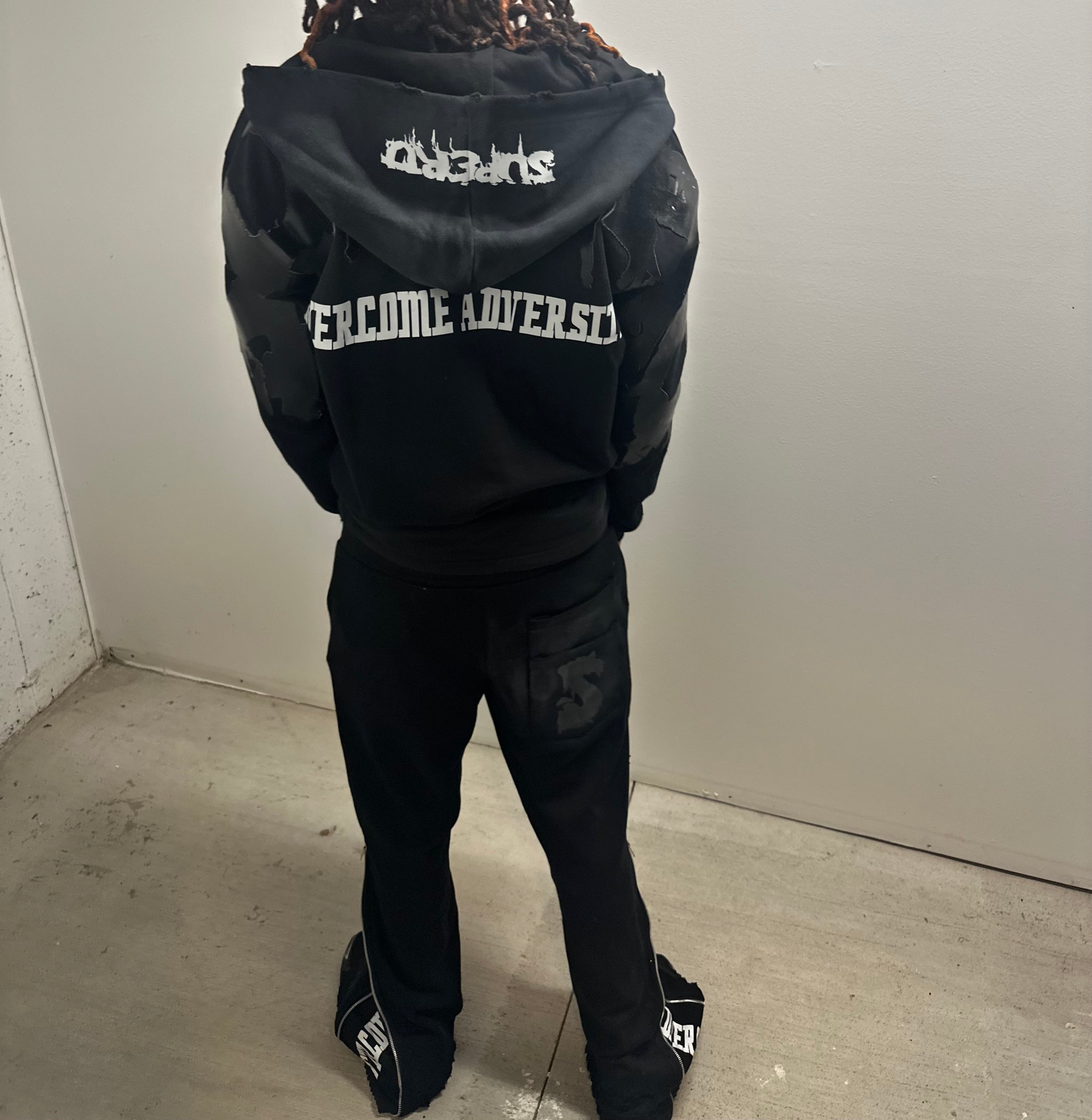 “HEAD ON A SWIVEL” TRACKSUIT (BLACK & WHITE)