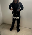 “HEAD ON A SWIVEL” TRACKSUIT (BLACK & WHITE)
