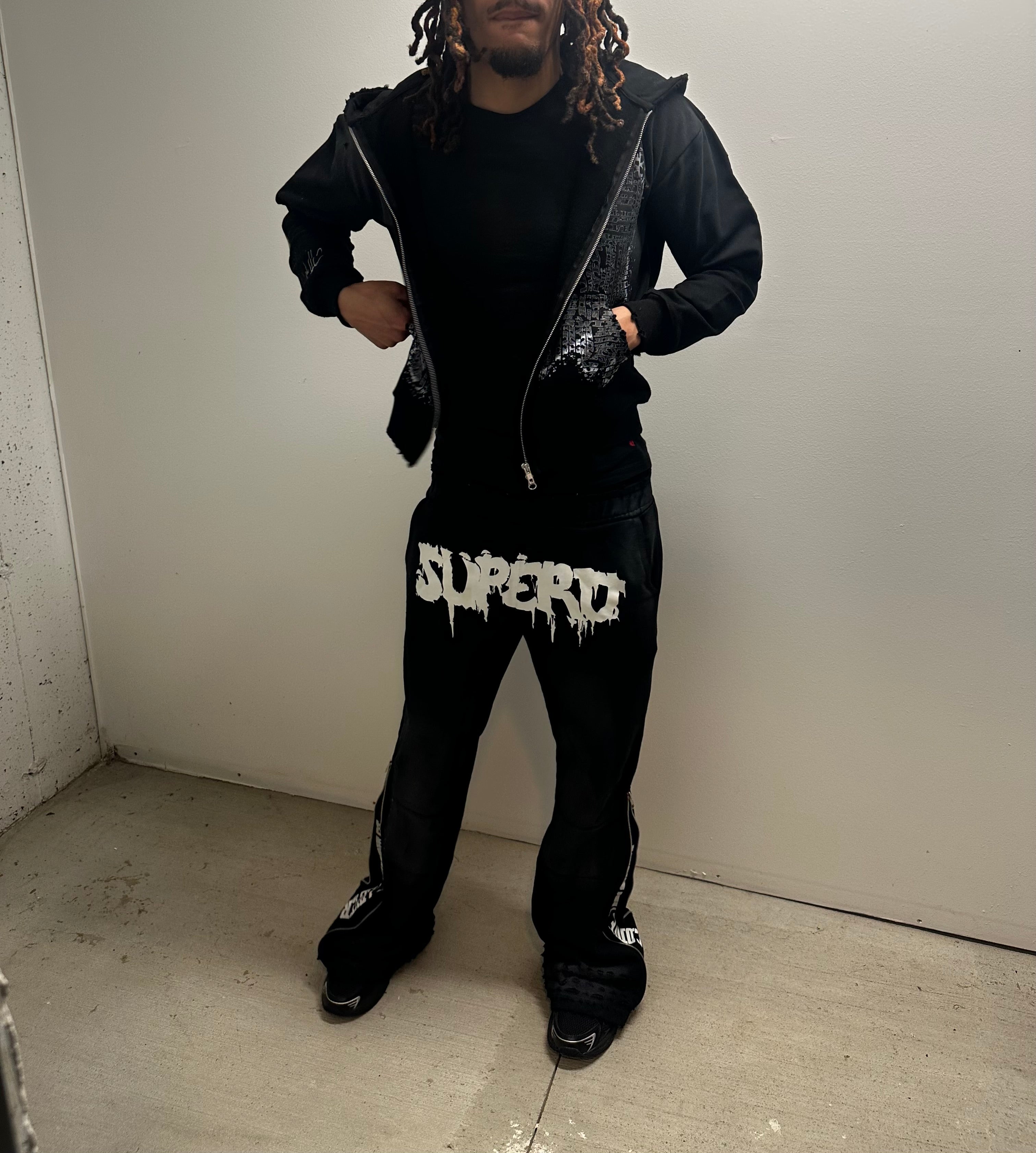 “HEAD ON A SWIVEL” TRACKSUIT (BLACK & WHITE)
